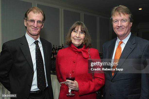 Tom Schatz, Carolyn Pfeiffer and Bill Powers, President of The University of Texas