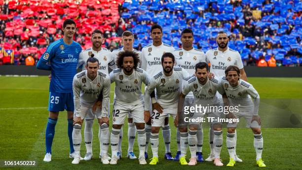 The team of Real Madrid pose for a photo prior the La Liga match between FC Barcelona and Real Madrid CF at Camp Nou on October 28, 2018 in...