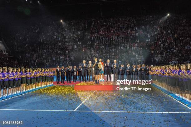 Roger Federer of Switzerland holds his trophy during the presentation ceremony of the Swiss Indoors Basel tennis tournament at St Jakobshalle on...