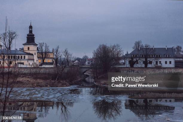 monastery and vistula river in winter, krakow, poland - cieszyn stock pictures, royalty-free photos & images