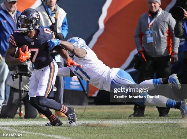 Anthony Miller of the Chicago Bears breaks away from Glover Quin of the Detroit Lions on his way to scoring a touchdwon at Soldier Field on November...