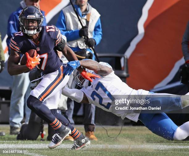 Anthony Miller of the Chicago Bears breaks away from Glover Quin of the Detroit Lions on his way to scoring a touchdwon at Soldier Field on November...