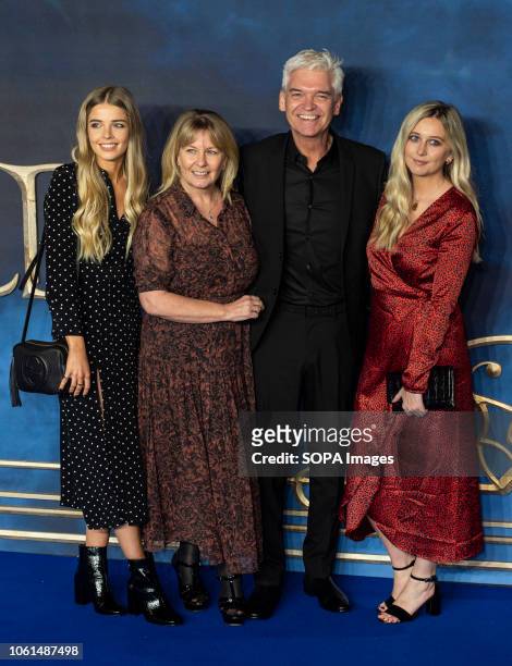 Ruby Lowe, Stephanie Lowe, Phillip Schofield and Molly Lowe are seen attending the UK Premiere of the 'Fantastic Beasts: The Crimes Of Grindelwald'...