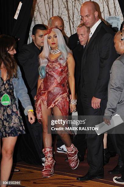 Lady Gaga wears her controversial meat dress, as she arrives in the Press Room after winning eight 2010 MTV Video Music Awards including "Video of...
