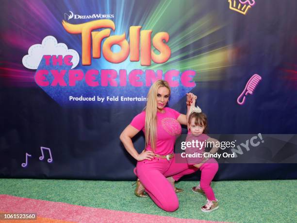 Coco Austin and daughter Chanel Marrow attend DreamWorks Trolls The Experience Rainbow Carpet Grand Opening on November 14, 2018 in New York City.