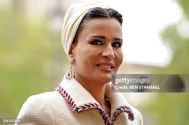Sheikha Mozah, arrives with her husband, Qatar's emir, Sheikh Hamad bin Khalifa al-Thani, for a private tour of Westminster Abbey in London, on...