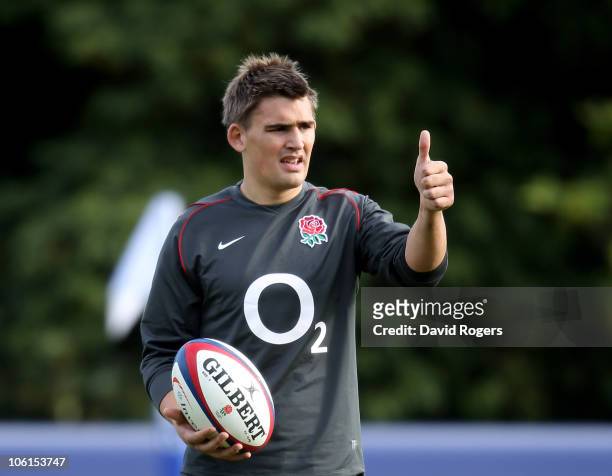Toby Flood signals during the England training session at Pennyhill Park Hotel on October 27, 2010 in Bagshot, England.