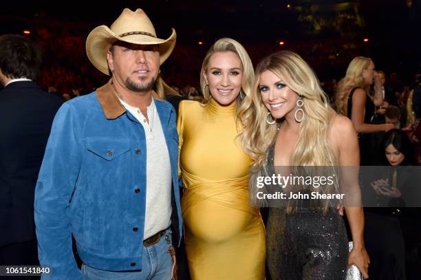 Singer-songwriter Jason Aldean, Brittany Kerr and singer-songwriter Lindsay Ell attend the 52nd annual CMA Awards at the Bridgestone Arena on...