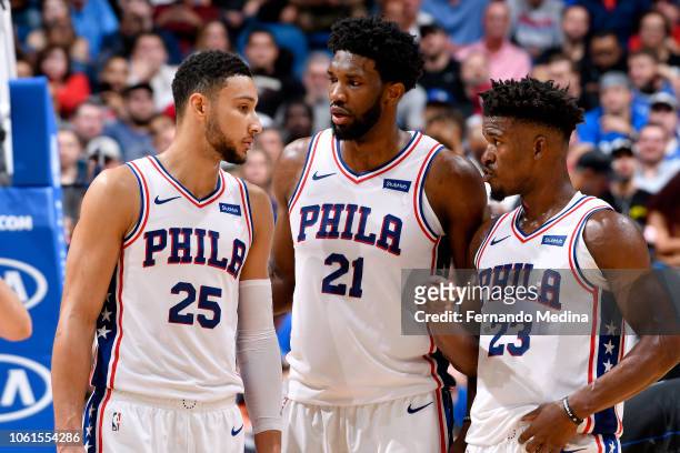 Ben Simmons, Joel Embiid, and Jimmy Butler of the Philadelphia 76ers talk during the game against the Orlando Magic on November 14, 2018 at Amway...