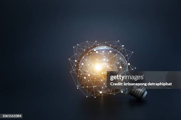 light bulbs concept,ideas of new ideas with innovative technology and creativity. - awareness and vision stock-fotos und bilder