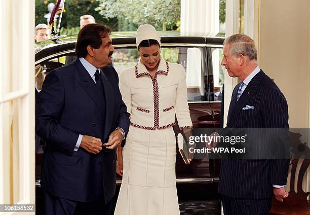 His Highness the Emir of the State of Qatar, Sheikh Hamad bin Khalifa Al Thani and his wife, Sheikha Mozah bint Nasser Al-Missned are greeted by...