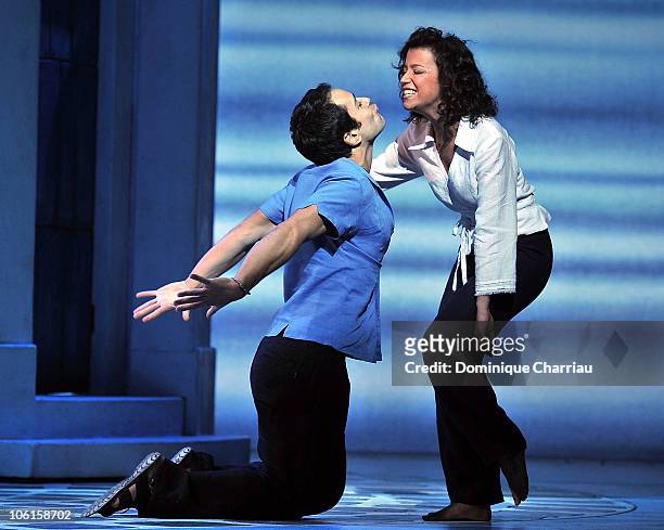 Dan Menash and Gaelle Gauthier perform on stage during the Mamma-Mia rehearsals at Theatre Mogador on October 27, 2010 in Paris, France.