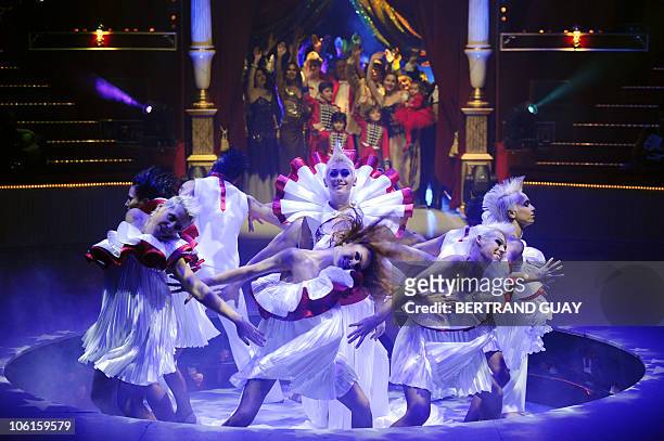Artists wave at the end of the "Prestige" Bouglione circus show at the Cirque d'Hiver in Paris on October 26, 2010. AFP PHOTO / BERTRAND GUAY