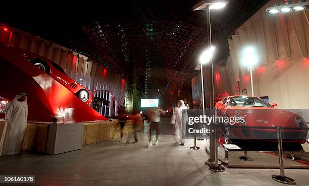 Visitors tour the Ferrari theme park during its media launch in the Emirati capital of Abu Dhabi on October 27, 2010. "Ferrari World Abu Dhabi" is...