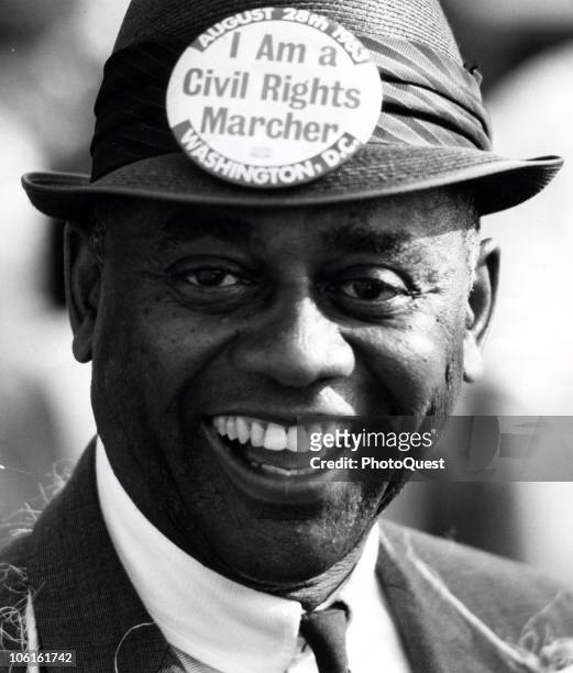 Close-up of the smiling face of an unidentified Civil Rights marcher during the March on Washington for Jobs and Freedom, Washington DC, August 28,...