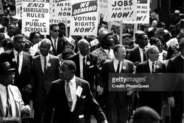 Civil Rights leaders holds hands as they march along the National Mall during the March on Washington for Jobs and Freedom, Washington DC, August 28,...