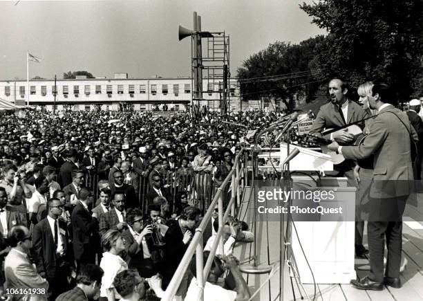American folk and pop group Peter, Paul and Mary perform during the March on Washington for Jobs and Freedom, Washington DC, August 28, 1963. The...