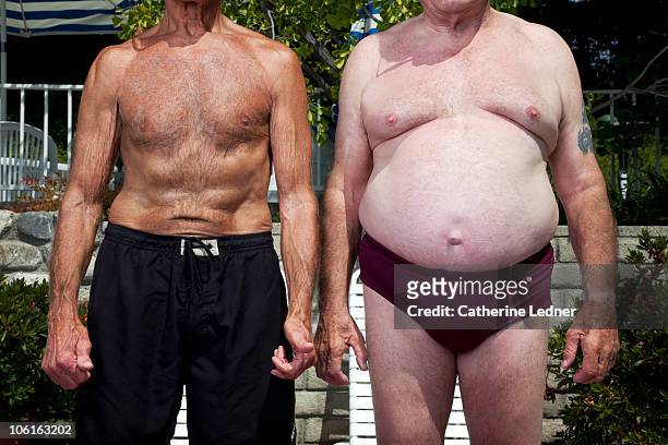 close up of senior men in swimming suits - fat man speedo stock pictures, royalty-free photos & images