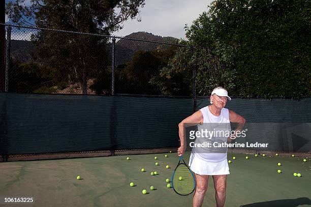 senior woman playing tennis - defeat funny stock pictures, royalty-free photos & images
