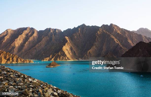 hatta lake in dubai emirate, uae - dubai sunset desert stock pictures, royalty-free photos & images