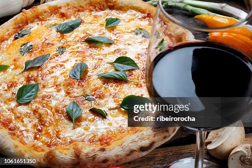 Pizza with glass of red wine Pizza with glass of red wine
