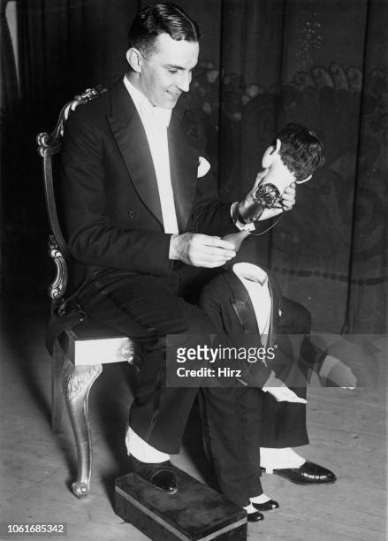 Paul Edgar Rieck aka 'The Great Edgar' assembles his dummy 'Josef' for his ventriloquist act, in preparation for a variety show in Berlin, Germany,...