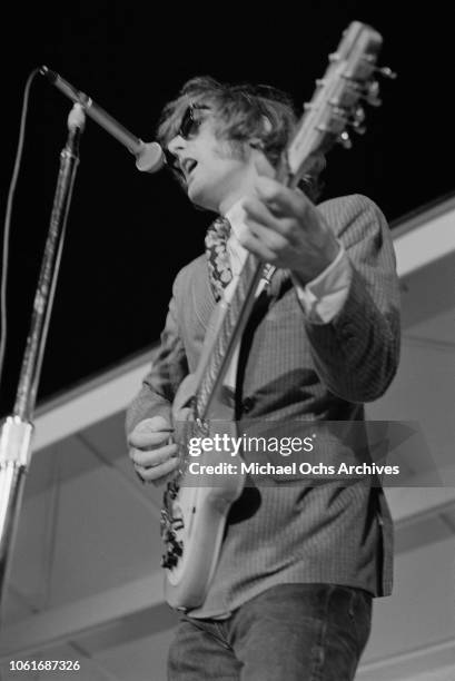 Jim McGuinn, later known as Roger McGuinn, frontman for American rock band The Byrds, performs at Soundblast '66 at the Yankee Stadium in New York...