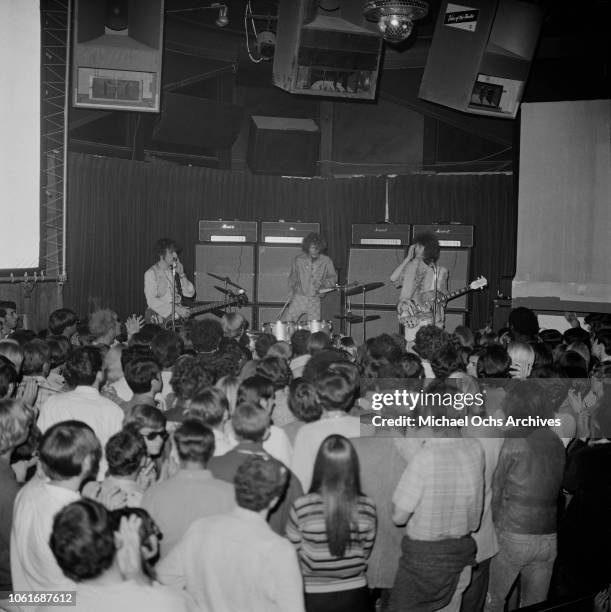 British rock band Cream in concert, USA, circa 1967. From left to right, singer Jack Bruce, drummer Ginger Baker and guitarist Eric Clapton.