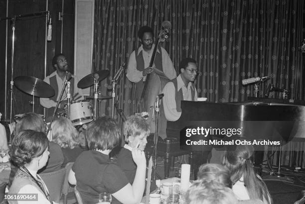 American jazz pianist Ramsey Lewis in concert at a Chicago club, USA, circa 1975.