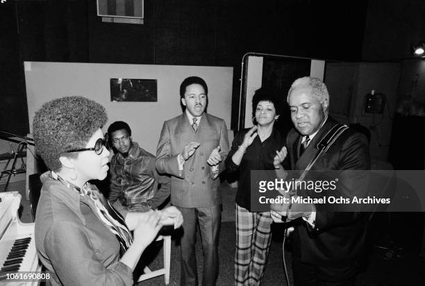 American gospel and soul group The Staple Singers, fronted by Roebuck 'Pops' Staples rehearsing for the Stax Records Christmas concert in Memphis,...