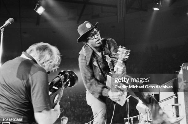 American musician Bo Diddley performs at Madison Square Garden in New York City, for the concert movie 'Let the Good Times Roll', May 1972. He is...