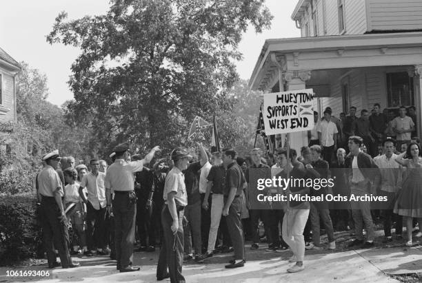 Crowd of students from Hueytown High School in Birmingham, Alabama, flying the Confederate flag in opposition to the start of the Birmingham...