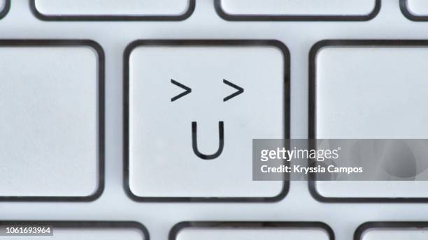 happy anthropomorphic face key on computer keyboard - letter u stock pictures, royalty-free photos & images