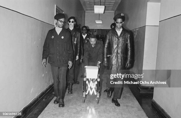 Members of the Black Panther Party attend the funeral of a baby of one of the Black Panthers and a Swedish mother, USA, 19th April 1969.