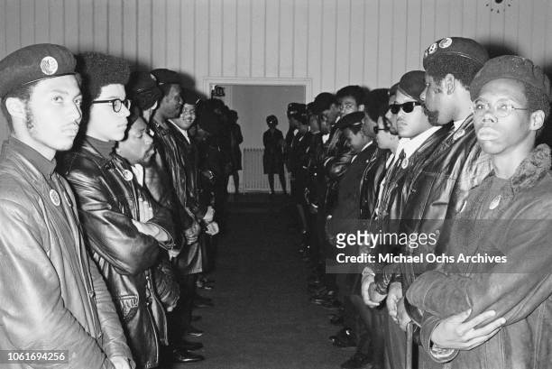 Members of the Black Panther Party attend the funeral of a baby of one of the Black Panthers and a Swedish mother, USA, 19th April 1969. The man on...