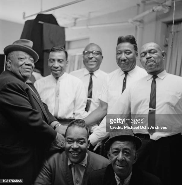 From left to right, Jimmy Rushing, T-Bone Walker, Sonny Terry, Muddy Waters and Brownie McGhee; James Cotton and comic MC Spodie Odie, backstage at...