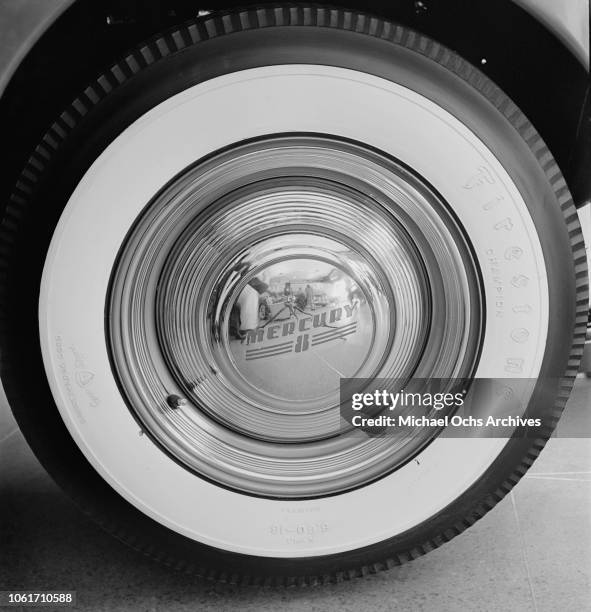 The tyre of a 1941 Mercury Eight at a car showroom, USA, 1941.