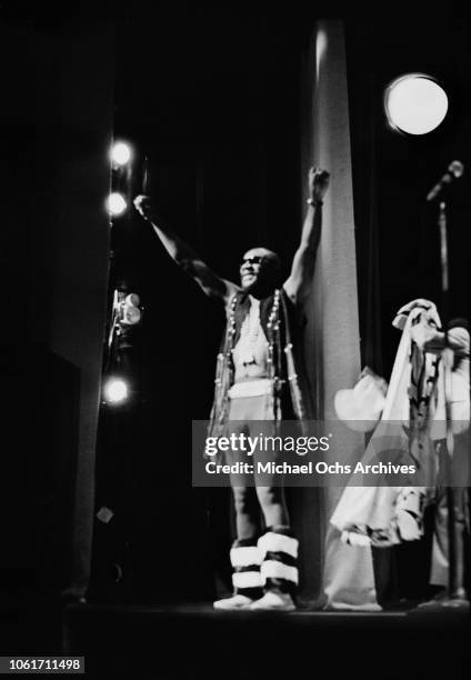 American soul singer and musician Isaac Hayes performs at the Apollo Theater on West 125th Street, New York City, 26th June 1970.