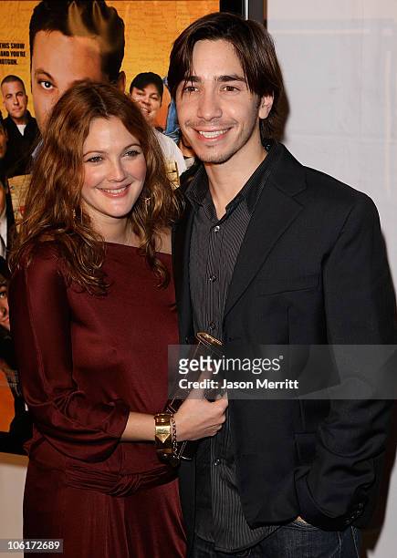 Justin Long and Drew Barrymore arrive at premiere of 'Vince Vaughn's Wild West Comedy Show' in Los Angeles on Monday, Jan. 28, 2008.