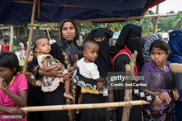 medical check-up for rohingya children at refugee camp in bangladesh - refugee health stock pictures, royalty-free photos & images