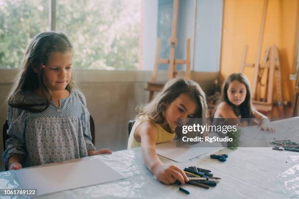 children drawing with crayons - fidget spinner stock pictures, royalty-free photos & images