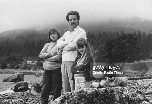 Actor Eric Thompson, narrator of the children's television series 'The Magic Roundabout', pictured with his daughters Emma and Sophie and the puppets...