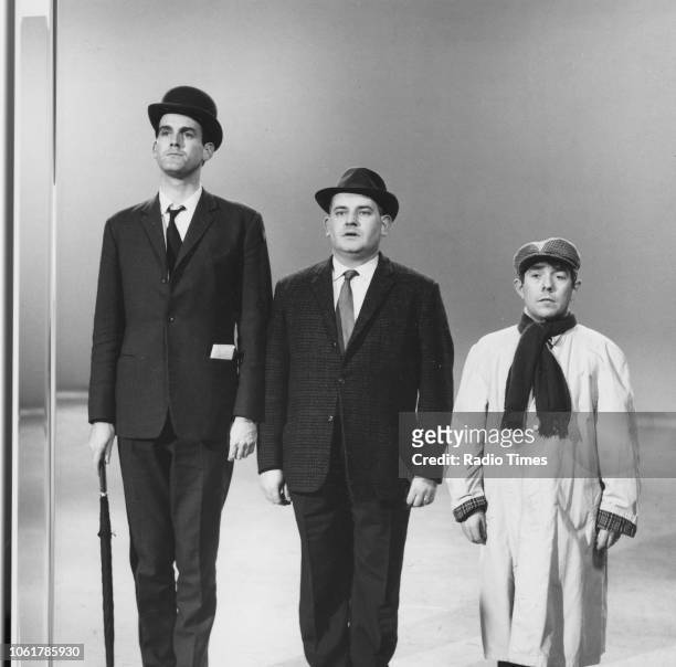 Comic actors John Cleese, Ronnie Barker and Ronnie Corbett in the class sketch from the television series 'The Frost Report', March 12th 1967. First...