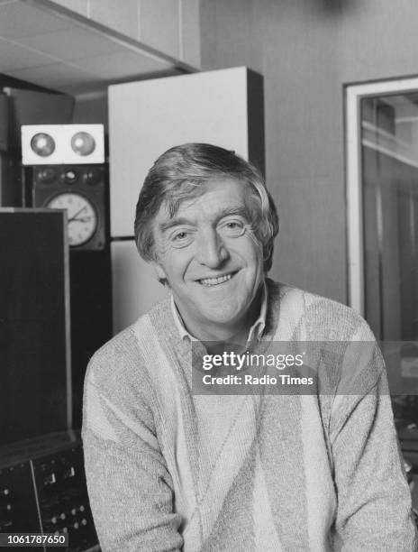 Portrait of presenter Michael Parkinson in a radio studio, November 1985.