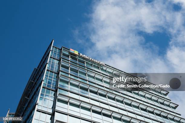 Low-angle view of logo on facade at the regional headquarters of Microsoft in the Silicon Valley town of Sunnyvale, California, October 28, 2018.