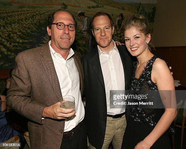 Charles Weinstock, Toby Emmerich, and Rosamund Pike