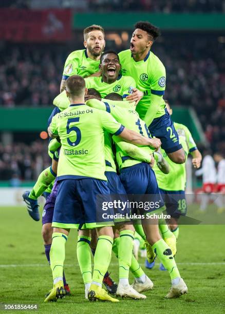 Players of Schalke 04 celebrate their win after the penalty shoot out the DFB Cup match between 1. FC Koeln and FC Schalke 04 at RheinEnergieStadion...