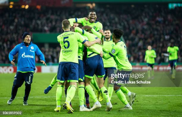 Players of Schalke 04 celebrate their win after the penalty shoot out the DFB Cup match between 1. FC Koeln and FC Schalke 04 at RheinEnergieStadion...