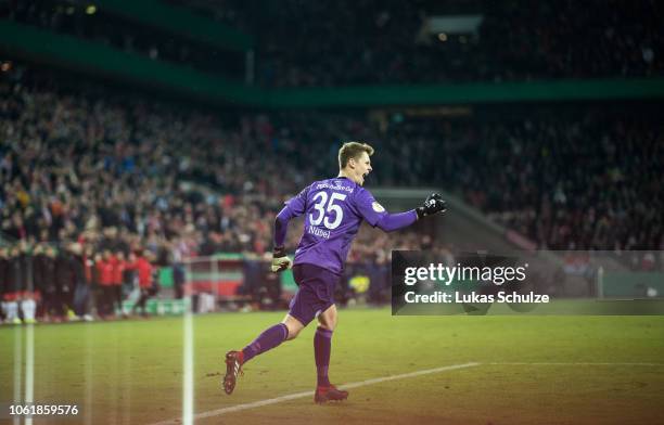 Goalkeeper Alexander Nuebel of Schalke celebrates his team's win after penalty shoot out after the DFB Cup match between 1. FC Koeln and FC Schalke...