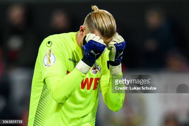 Goalkeeper Timo Horn of Koeln looks dejected during the DFB Cup match between 1. FC Koeln and FC Schalke 04 at RheinEnergieStadion on October 31,...